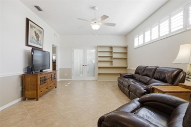This concrete block/stucco home boasts a new roof and gutters in on Monarch At Royal Highlands in Florida - for sale on GolfHomes.com, golf home, golf lot