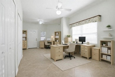 This concrete block/stucco home boasts a new roof and gutters in on Monarch At Royal Highlands in Florida - for sale on GolfHomes.com, golf home, golf lot