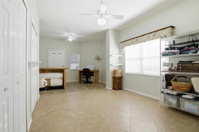 This concrete block/stucco home boasts a new roof and gutters in on Monarch At Royal Highlands in Florida - for sale on GolfHomes.com, golf home, golf lot