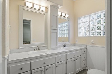 This concrete block/stucco home boasts a new roof and gutters in on Monarch At Royal Highlands in Florida - for sale on GolfHomes.com, golf home, golf lot