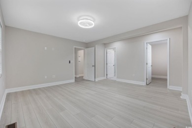 Absolutely stunning and fully remodeled from top to bottom in on Burning Ridge Golf Course in South Carolina - for sale on GolfHomes.com, golf home, golf lot