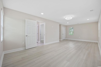 Absolutely stunning and fully remodeled from top to bottom in on Burning Ridge Golf Course in South Carolina - for sale on GolfHomes.com, golf home, golf lot