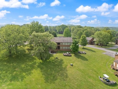 Spacious lower level 3 bedroom 2 full bath condo located at on Woodson Bend Resort in Kentucky - for sale on GolfHomes.com, golf home, golf lot