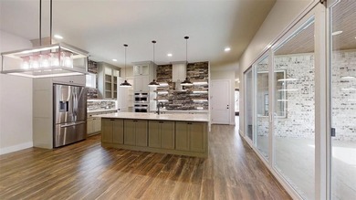 Experience luxury living in the gated enclave of freestanding on Harbor Lakes Golf Club in Texas - for sale on GolfHomes.com, golf home, golf lot