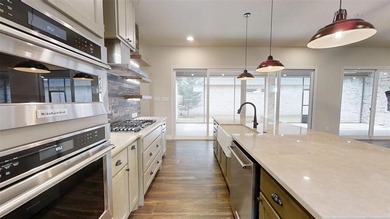 Experience luxury living in the gated enclave of freestanding on Harbor Lakes Golf Club in Texas - for sale on GolfHomes.com, golf home, golf lot