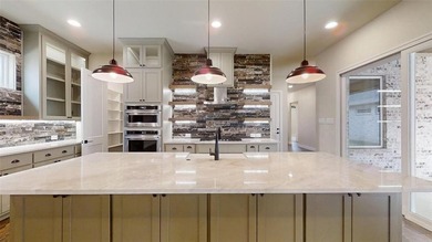 Experience luxury living in the gated enclave of freestanding on Harbor Lakes Golf Club in Texas - for sale on GolfHomes.com, golf home, golf lot