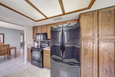 Welcome to this beautifully maintained 2-bedroom, 1.75-bath home on Westbrook Village Golf Club in Arizona - for sale on GolfHomes.com, golf home, golf lot