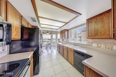 Welcome to this beautifully maintained 2-bedroom, 1.75-bath home on Westbrook Village Golf Club in Arizona - for sale on GolfHomes.com, golf home, golf lot