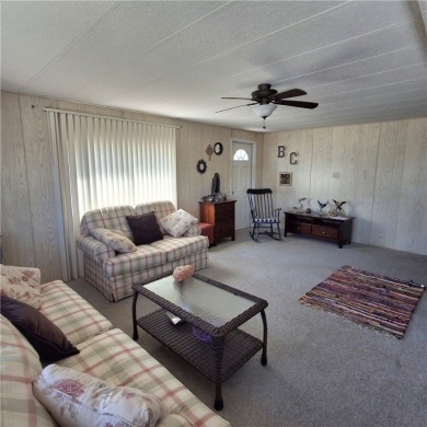 Light, Bright & Full of Possibilities in Barefoot Bay! Step into on Barefoot Bay Golf Course in Florida - for sale on GolfHomes.com, golf home, golf lot