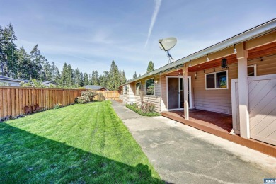 Charming 3-Bedroom Home with Fireplace, Hot Tub  Privacy Fence! on SunLand Golf and Country Club in Washington - for sale on GolfHomes.com, golf home, golf lot
