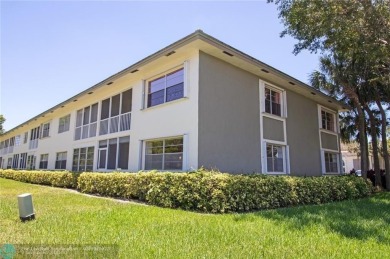 Welcome to 2614 Nassau Bnd #A1in Coconut Creek. This is a on Wynmoor Golf Course in Florida - for sale on GolfHomes.com, golf home, golf lot