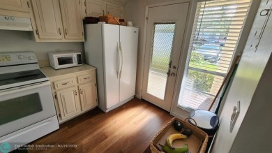 Welcome to 2614 Nassau Bnd #A1in Coconut Creek. This is a on Wynmoor Golf Course in Florida - for sale on GolfHomes.com, golf home, golf lot