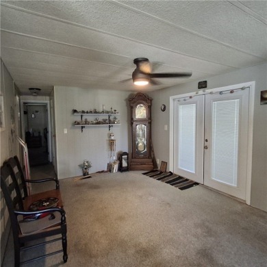 Light, Bright & Full of Possibilities in Barefoot Bay! Step into on Barefoot Bay Golf Course in Florida - for sale on GolfHomes.com, golf home, golf lot