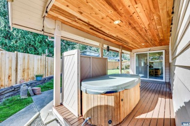 Charming 3-Bedroom Home with Fireplace, Hot Tub  Privacy Fence! on SunLand Golf and Country Club in Washington - for sale on GolfHomes.com, golf home, golf lot