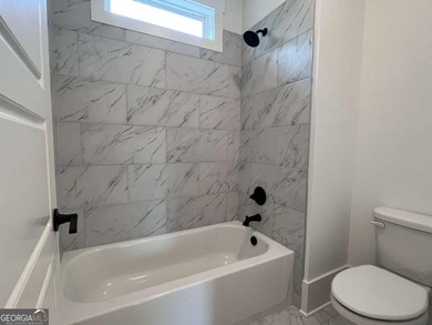 **Stunning New Construction with Owner's Suite on Main & Outdoor on Traditions of Braselton Golf Club in Georgia - for sale on GolfHomes.com, golf home, golf lot