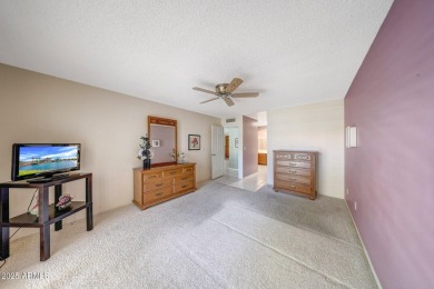 Welcome to this beautifully maintained 2-bedroom, 1.75-bath home on Westbrook Village Golf Club in Arizona - for sale on GolfHomes.com, golf home, golf lot