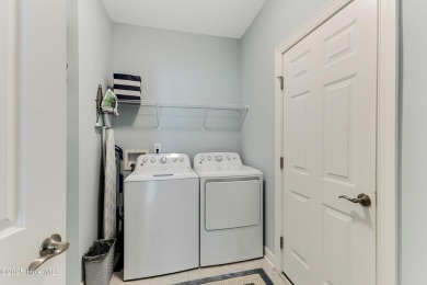 Charming Coastal Cottage in Winding River Plantation - Priced to on Carolina National Golf Club in North Carolina - for sale on GolfHomes.com, golf home, golf lot