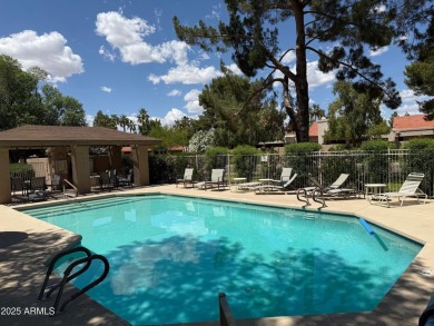 Welcome to this beautifully maintained 2-bedroom, 1.75-bath home on Westbrook Village Golf Club in Arizona - for sale on GolfHomes.com, golf home, golf lot