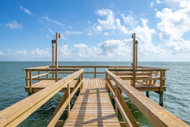 Located in the gated community of Heron's Roost, 27 Primrose on Rockport Country Club in Texas - for sale on GolfHomes.com, golf home, golf lot