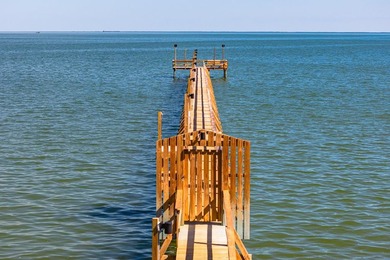 Located in the gated community of Heron's Roost, 27 Primrose on Rockport Country Club in Texas - for sale on GolfHomes.com, golf home, golf lot