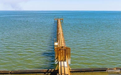 Located in the gated community of Heron's Roost, 27 Primrose on Rockport Country Club in Texas - for sale on GolfHomes.com, golf home, golf lot