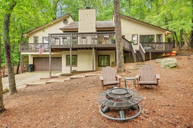 Perched above the shoreline on nearly half an acre, this turnkey on The Highlands Course at Lake Arrowhead in Georgia - for sale on GolfHomes.com, golf home, golf lot