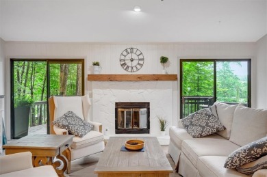 Perched above the shoreline on nearly half an acre, this turnkey on The Highlands Course at Lake Arrowhead in Georgia - for sale on GolfHomes.com, golf home, golf lot