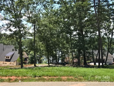 This premium Badin Lake water view lot is located in the on Old North State Club at Uwharrie Point Golf community in North Carolina - for sale on GolfHomes.com, golf home, golf lot