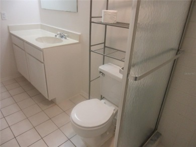 AFFORDBLE GROUND FLOOR 2/2 CONDOMINIUM JUST 500 FEET AWAY FROM on Country Club At Silver Springs Shores in Florida - for sale on GolfHomes.com, golf home, golf lot