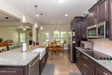 Welcome to this beautiful custom-built 4-bedroom, 3.5-bath home on Whispering Woods in North Carolina - for sale on GolfHomes.com, golf home, golf lot