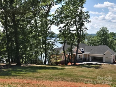 This premium Badin Lake water view lot is located in the on Old North State Club at Uwharrie Point Golf community in North Carolina - for sale on GolfHomes.com, golf home, golf lot