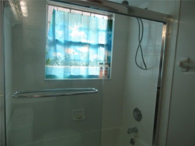 AFFORDBLE GROUND FLOOR 2/2 CONDOMINIUM JUST 500 FEET AWAY FROM on Country Club At Silver Springs Shores in Florida - for sale on GolfHomes.com, golf home, golf lot