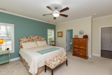 Welcome to this beautiful custom-built 4-bedroom, 3.5-bath home on Whispering Woods in North Carolina - for sale on GolfHomes.com, golf home, golf lot