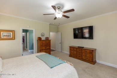 Welcome to this beautiful custom-built 4-bedroom, 3.5-bath home on Whispering Woods in North Carolina - for sale on GolfHomes.com, golf home, golf lot