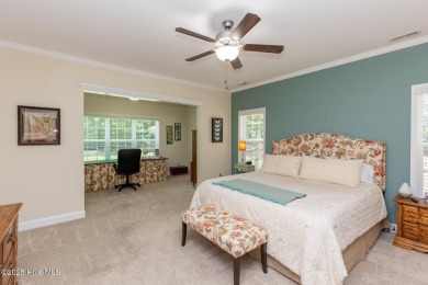 Welcome to this beautiful custom-built 4-bedroom, 3.5-bath home on Whispering Woods in North Carolina - for sale on GolfHomes.com, golf home, golf lot