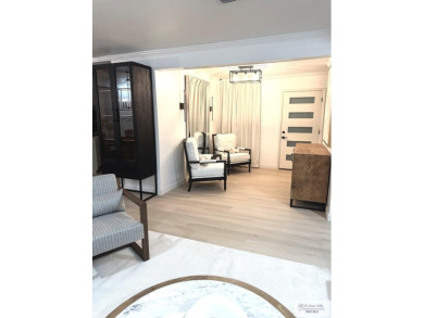 Welcome to this completely remodeled 4-bedroom, 4-bath home in on Rancho Viejo Resort and Country Club in Texas - for sale on GolfHomes.com, golf home, golf lot