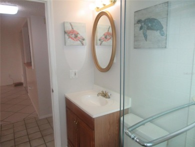 AFFORDBLE GROUND FLOOR 2/2 CONDOMINIUM JUST 500 FEET AWAY FROM on Country Club At Silver Springs Shores in Florida - for sale on GolfHomes.com, golf home, golf lot