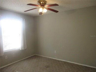 AFFORDBLE GROUND FLOOR 2/2 CONDOMINIUM JUST 500 FEET AWAY FROM on Country Club At Silver Springs Shores in Florida - for sale on GolfHomes.com, golf home, golf lot