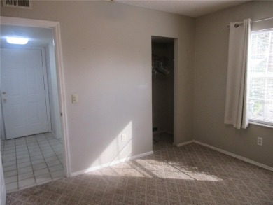 AFFORDBLE GROUND FLOOR 2/2 CONDOMINIUM JUST 500 FEET AWAY FROM on Country Club At Silver Springs Shores in Florida - for sale on GolfHomes.com, golf home, golf lot