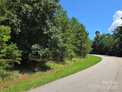 This premium Badin Lake water view lot is located in the on Old North State Club at Uwharrie Point Golf community in North Carolina - for sale on GolfHomes.com, golf home, golf lot