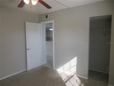 AFFORDBLE GROUND FLOOR 2/2 CONDOMINIUM JUST 500 FEET AWAY FROM on Country Club At Silver Springs Shores in Florida - for sale on GolfHomes.com, golf home, golf lot