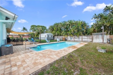 Remarkable Opportunity! Discover this Remodeled Concrete Block on Miles Grant Country Club in Florida - for sale on GolfHomes.com, golf home, golf lot