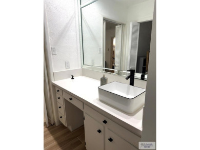 Welcome to this completely remodeled 4-bedroom, 4-bath home in on Rancho Viejo Resort and Country Club in Texas - for sale on GolfHomes.com, golf home, golf lot
