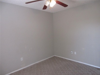AFFORDBLE GROUND FLOOR 2/2 CONDOMINIUM JUST 500 FEET AWAY FROM on Country Club At Silver Springs Shores in Florida - for sale on GolfHomes.com, golf home, golf lot