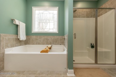 Welcome to this beautiful custom-built 4-bedroom, 3.5-bath home on Whispering Woods in North Carolina - for sale on GolfHomes.com, golf home, golf lot