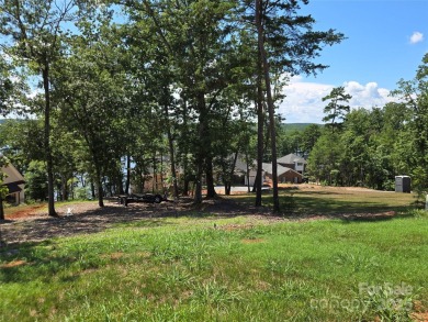 This premium Badin Lake water view lot is located in the on Old North State Club at Uwharrie Point Golf community in North Carolina - for sale on GolfHomes.com, golf home, golf lot