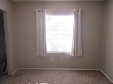 AFFORDBLE GROUND FLOOR 2/2 CONDOMINIUM JUST 500 FEET AWAY FROM on Country Club At Silver Springs Shores in Florida - for sale on GolfHomes.com, golf home, golf lot