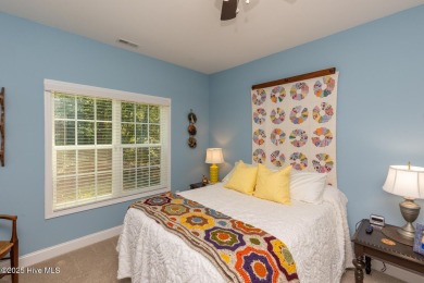 Welcome to this beautiful custom-built 4-bedroom, 3.5-bath home on Whispering Woods in North Carolina - for sale on GolfHomes.com, golf home, golf lot