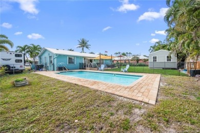 Remarkable Opportunity! Discover this Remodeled Concrete Block on Miles Grant Country Club in Florida - for sale on GolfHomes.com, golf home, golf lot