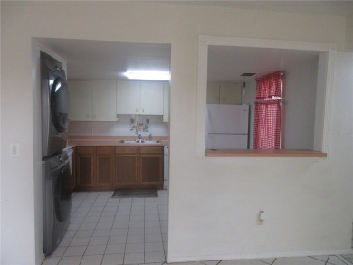 AFFORDBLE GROUND FLOOR 2/2 CONDOMINIUM JUST 500 FEET AWAY FROM on Country Club At Silver Springs Shores in Florida - for sale on GolfHomes.com, golf home, golf lot